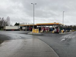 Shell forecourt, with HGV painted on the left and car truck stop painted on the right.