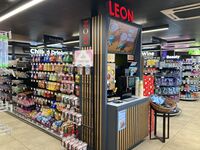 A Leon-branded coffee machine within a shop.