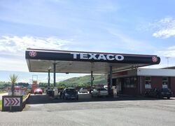 Petrol station with Texaco written across the canopy.
