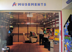 A sign saying Amusements, above a gaming arcade.