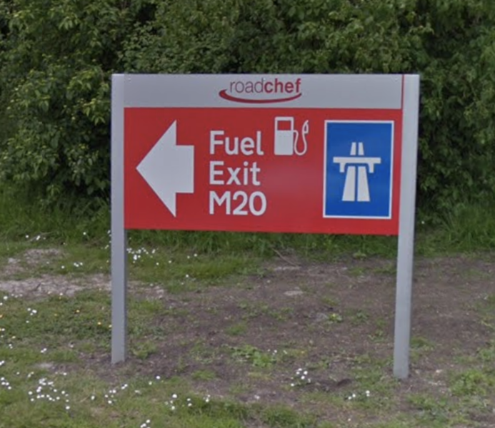 File:Maidstone red Roadchef exit sign.png