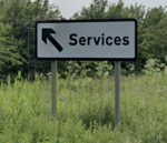 White services sign with slanted arrow.