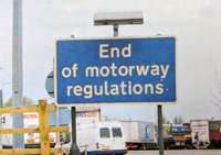 End of motorway regulations sign.