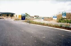 Welcome Break-branded road signs next to a construction site.