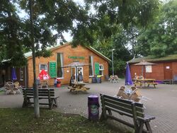 Small wooden huts called Cartgate Lodge.