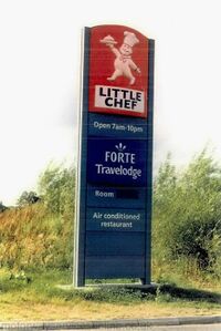 Sign saying Little Chef, open 7am-10pm, Forte Travelodge, air conditioned restaurant.